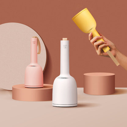 The Desktop Detailer: Mini Wireless Vacuum for Pet Hair and Desktop Cleanups