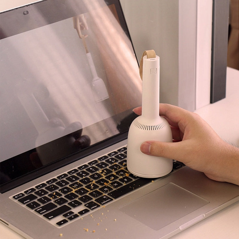 The Desktop Detailer: Mini Wireless Vacuum for Pet Hair and Desktop Cleanups